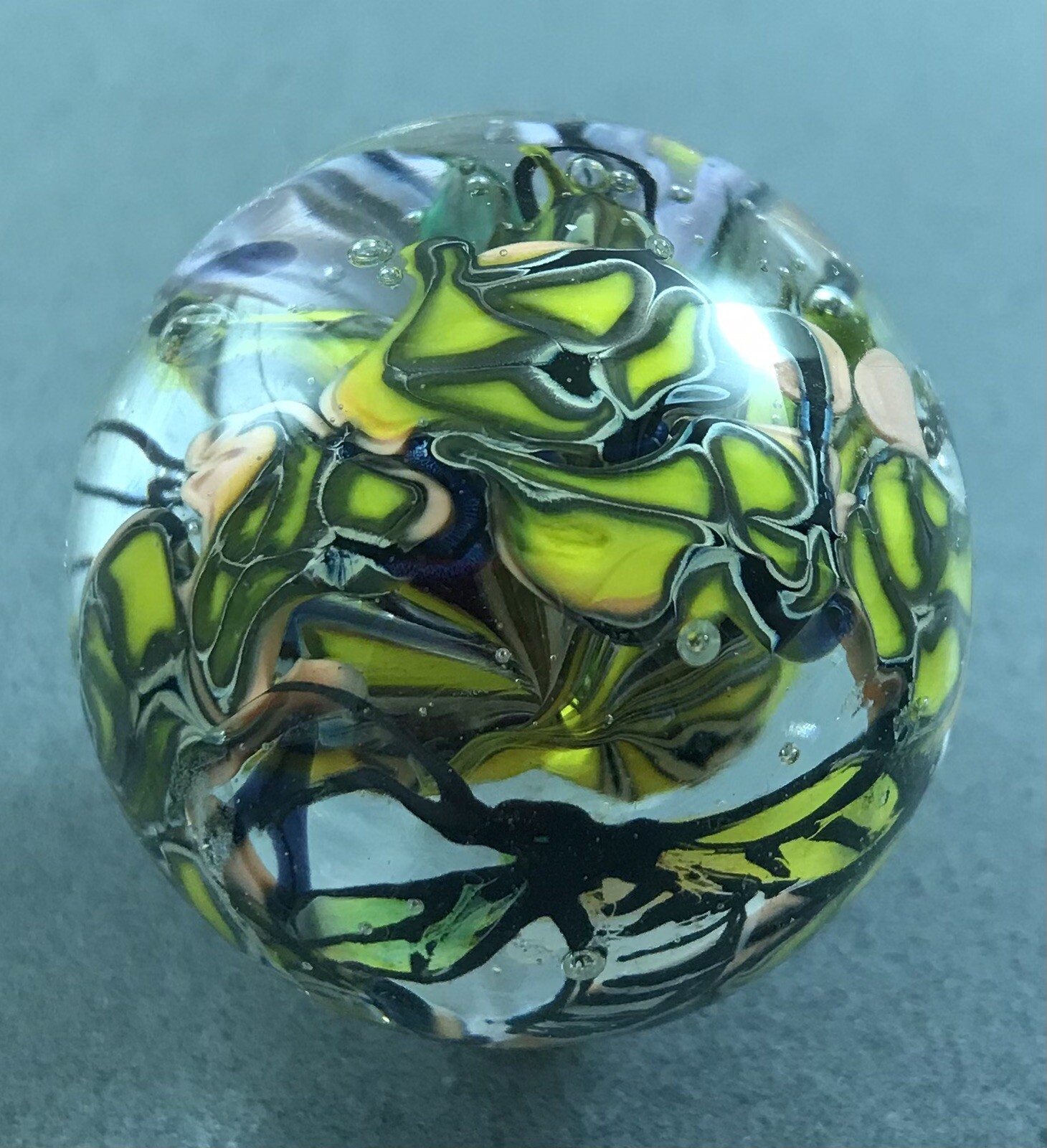 handmade 1 3/4” Purple Murrini Floral glass marble W/ Hand Painted Bug