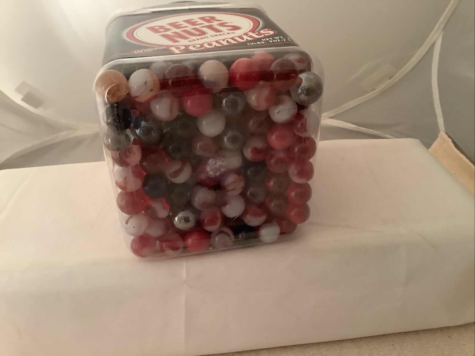 Plastic Bottle filled With A Mixture Of Marbles Found In A Garage.