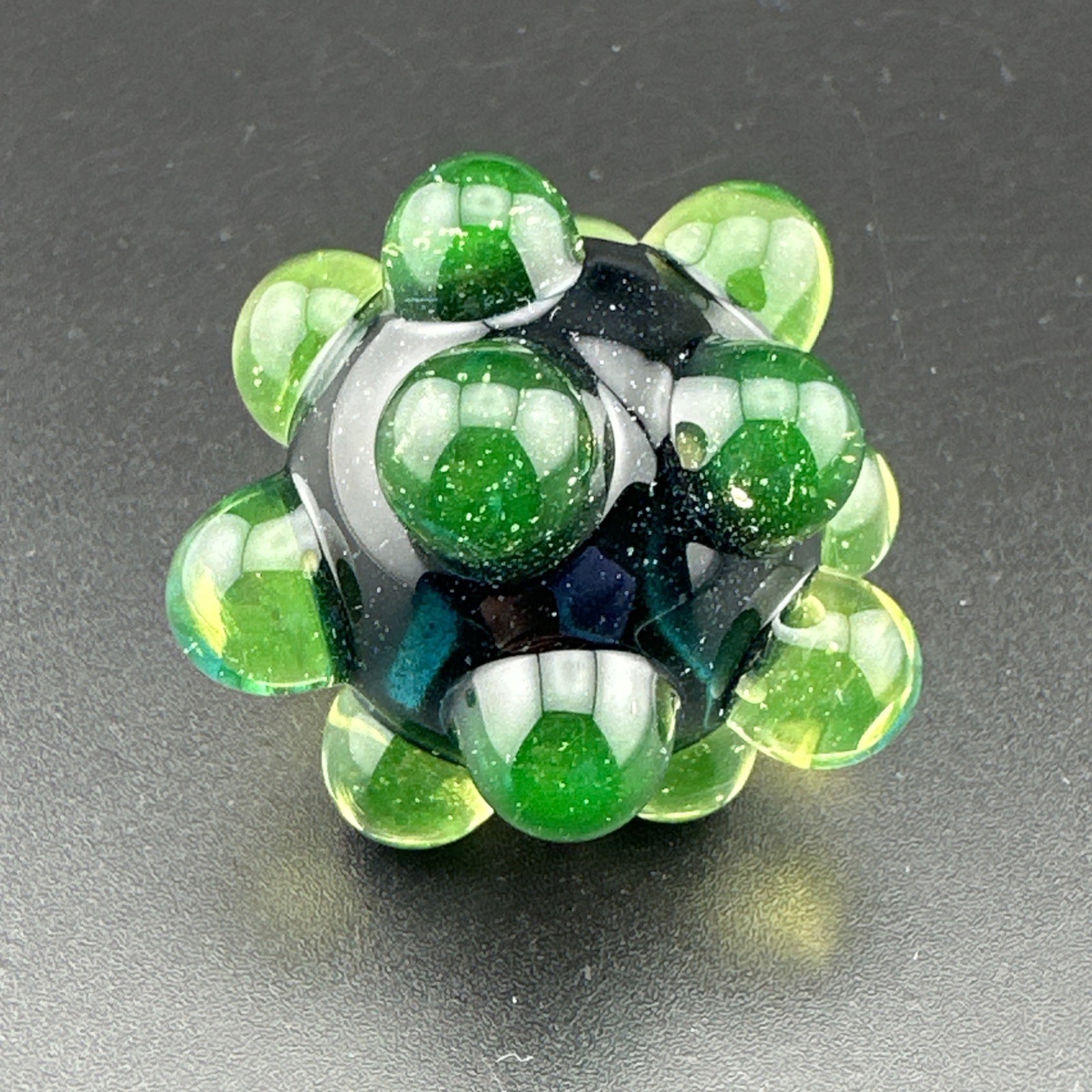Contemporary Handmade Art Glass Marble 1.45″ Sparkle Core Hobnail With UV Green!