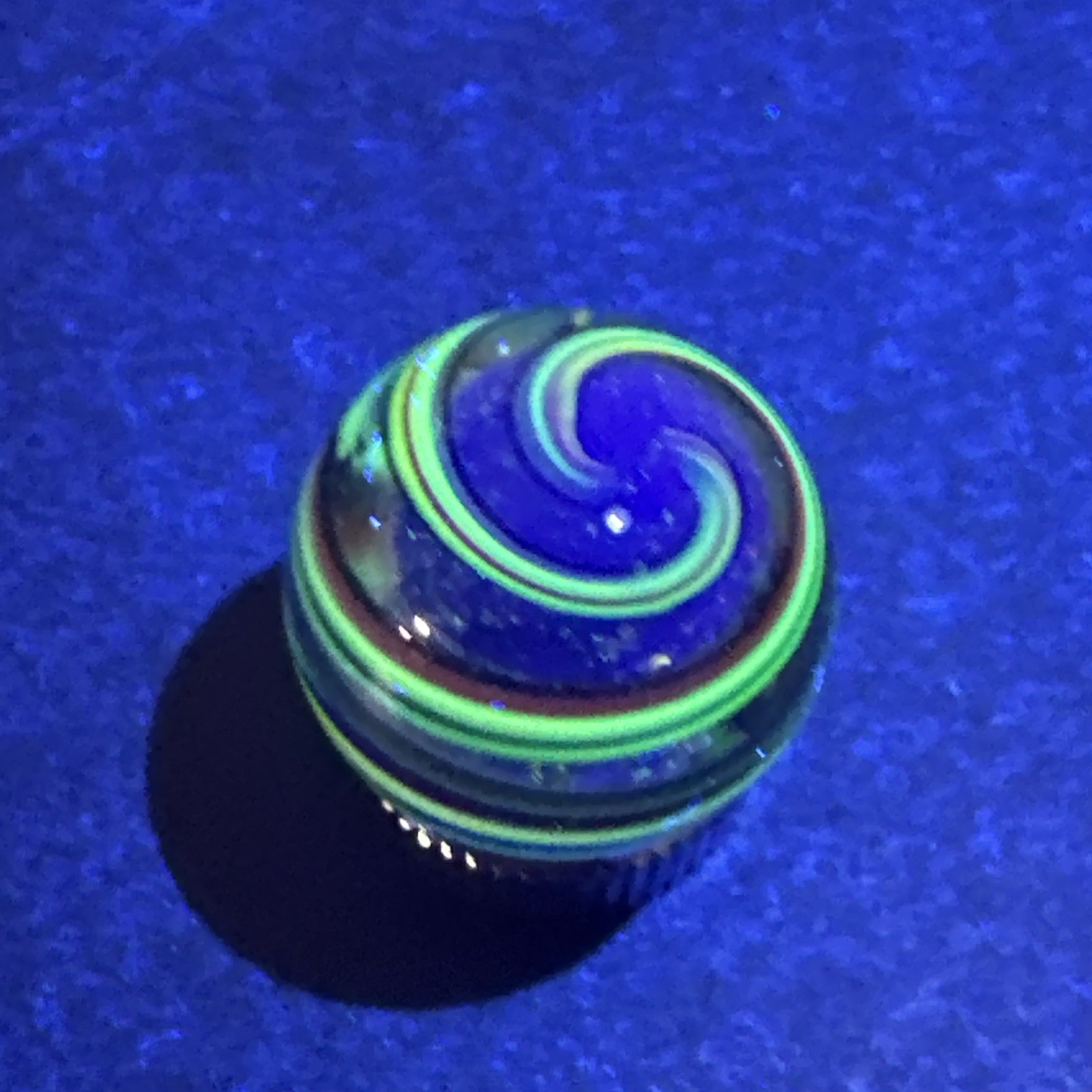 Contemporary Handmade Art Glass Marble .73″ Blue Sparkle Core, Swirls, UV Green