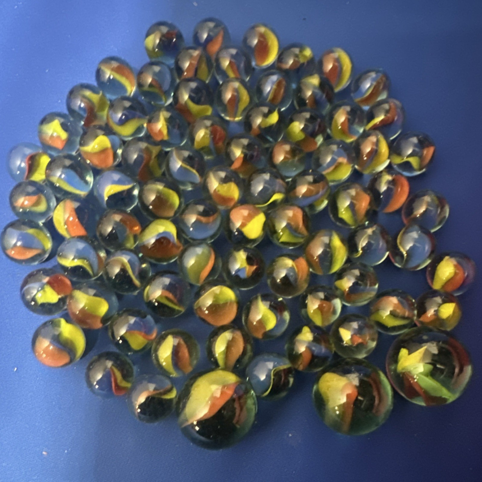 Cat’s Eye Glass Toy Marbles Lot Machine . unknown age