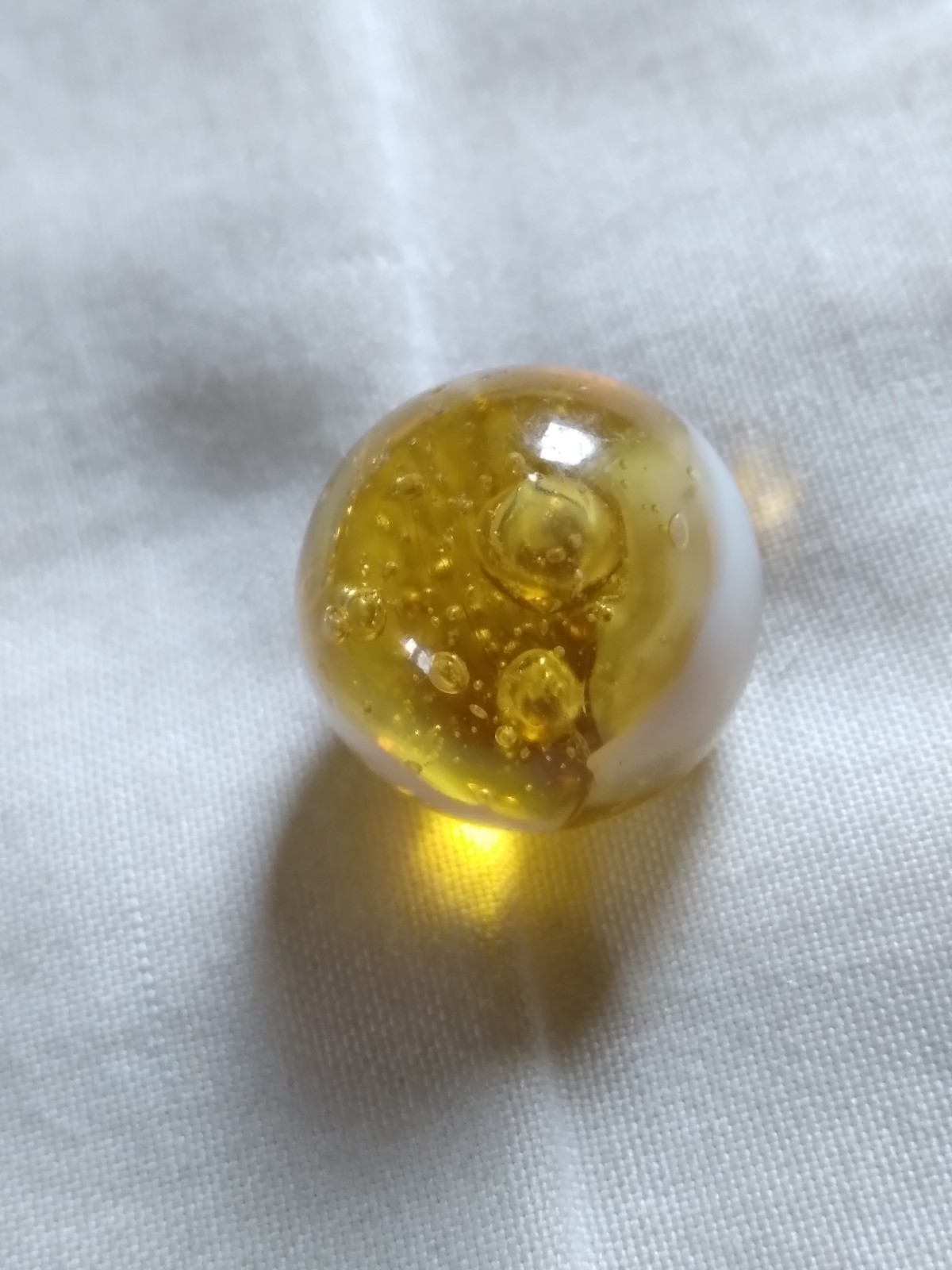 Vintage 9/16″ Yellow Glass Playing Marble.