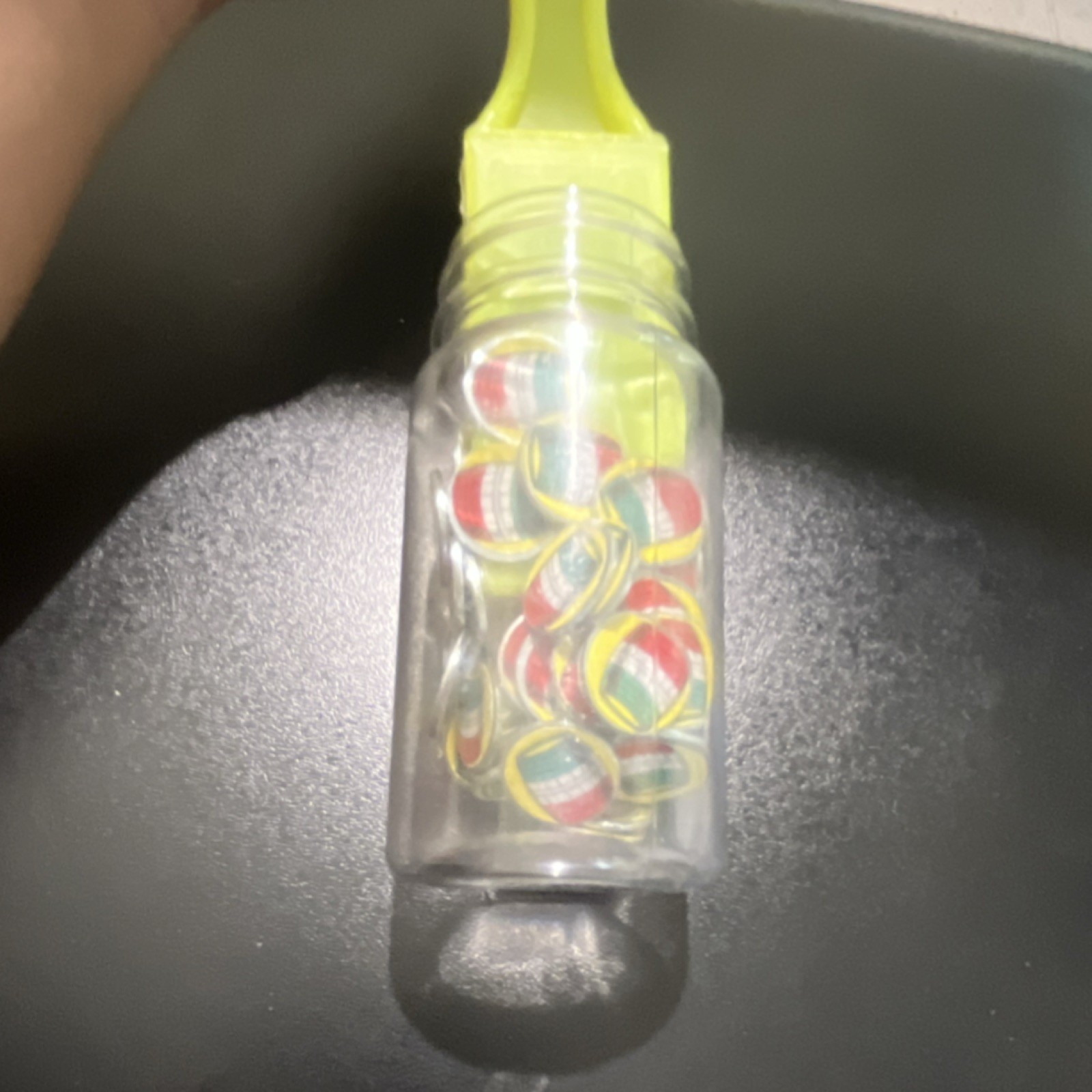Mixed Multicolor Swirl Toy Marbles, Clear Plastic Jar, Yellow Lid, Green Scoop