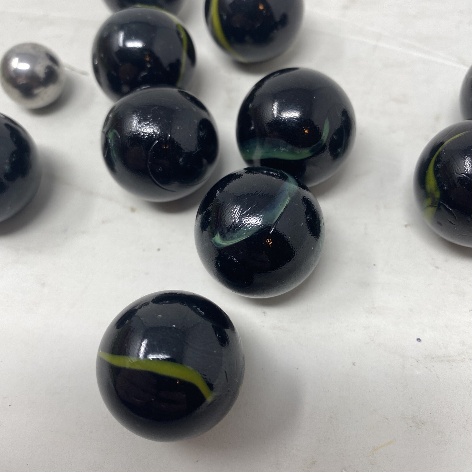 Lot Of 11 Vintage Marbles Black With Green/Yellow Color Swirl
