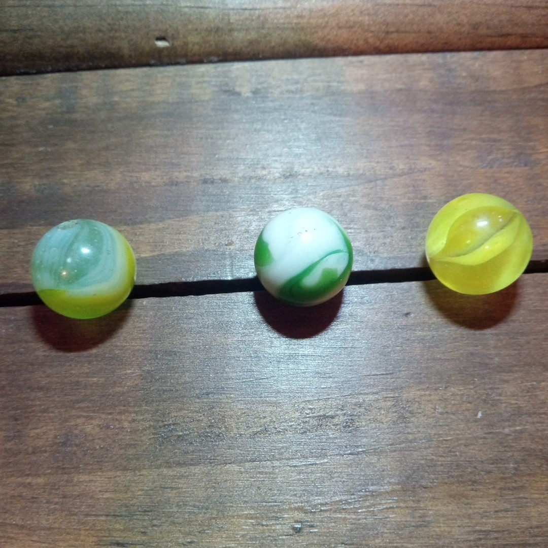 4 Vtg Uranium Glass Swirl Shooters Marbles UV Reactive Blacklight Glow Vaseline