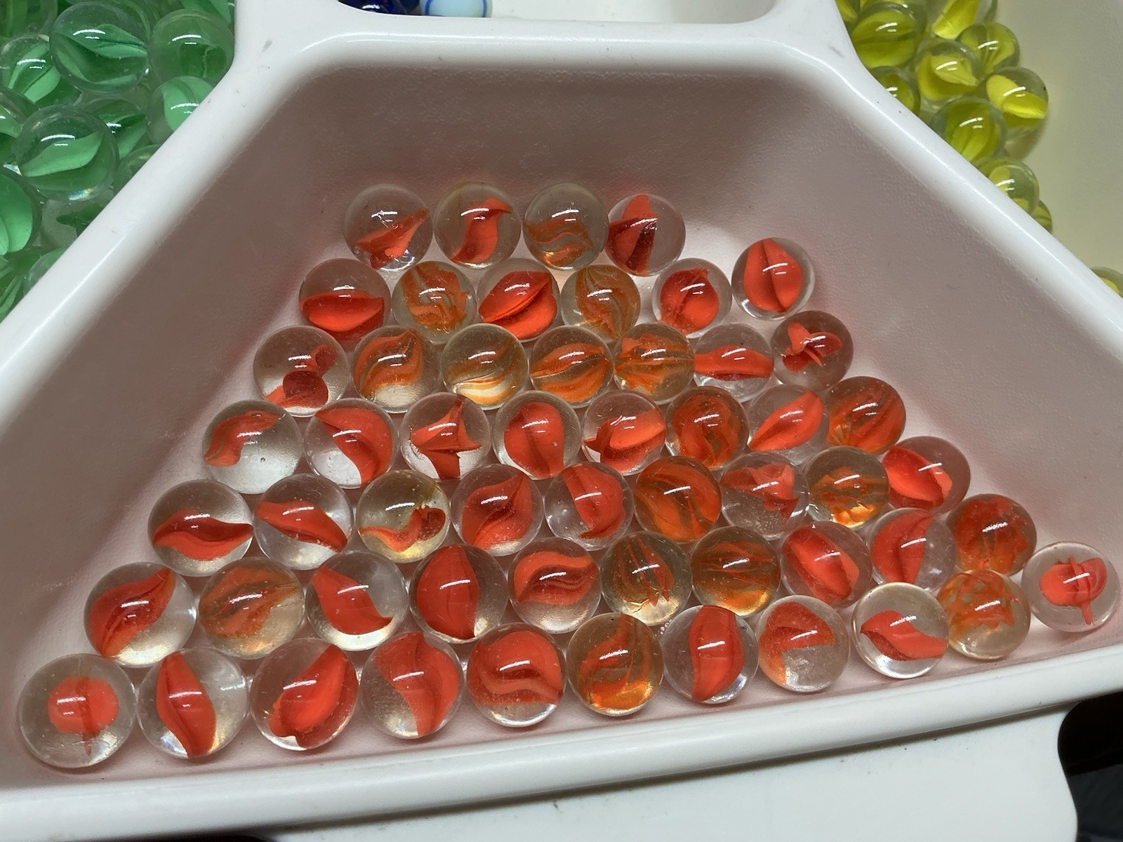 55 Orange Katseye Marbles, 10 Ounces
