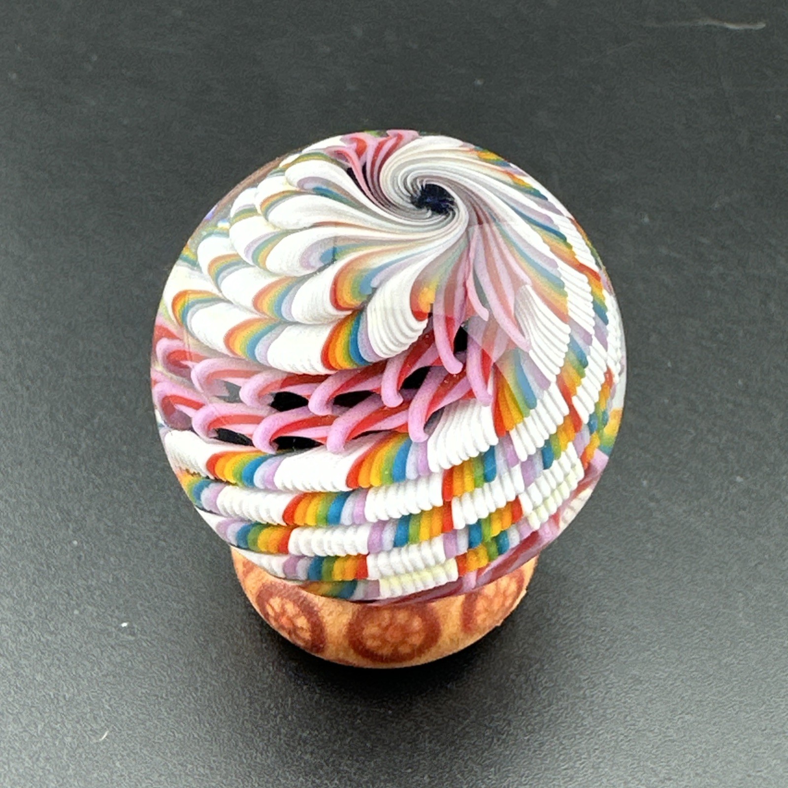 Contemporary Handmade Art Glass Marble 1.34″ Rainbow White Pink Cane, Black Core