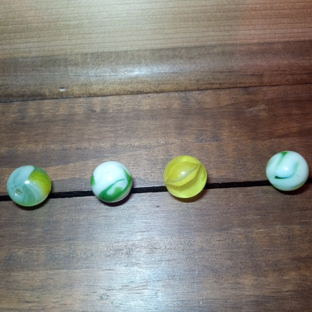 4 Vtg Uranium Glass Swirl Shooters Marbles UV Reactive Blacklight Glow Vaseline