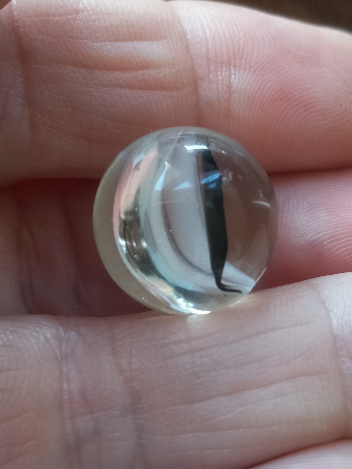 Gorgeous Vintage White Banana Cat’s Eye Marble with Black Stripe Peltier?