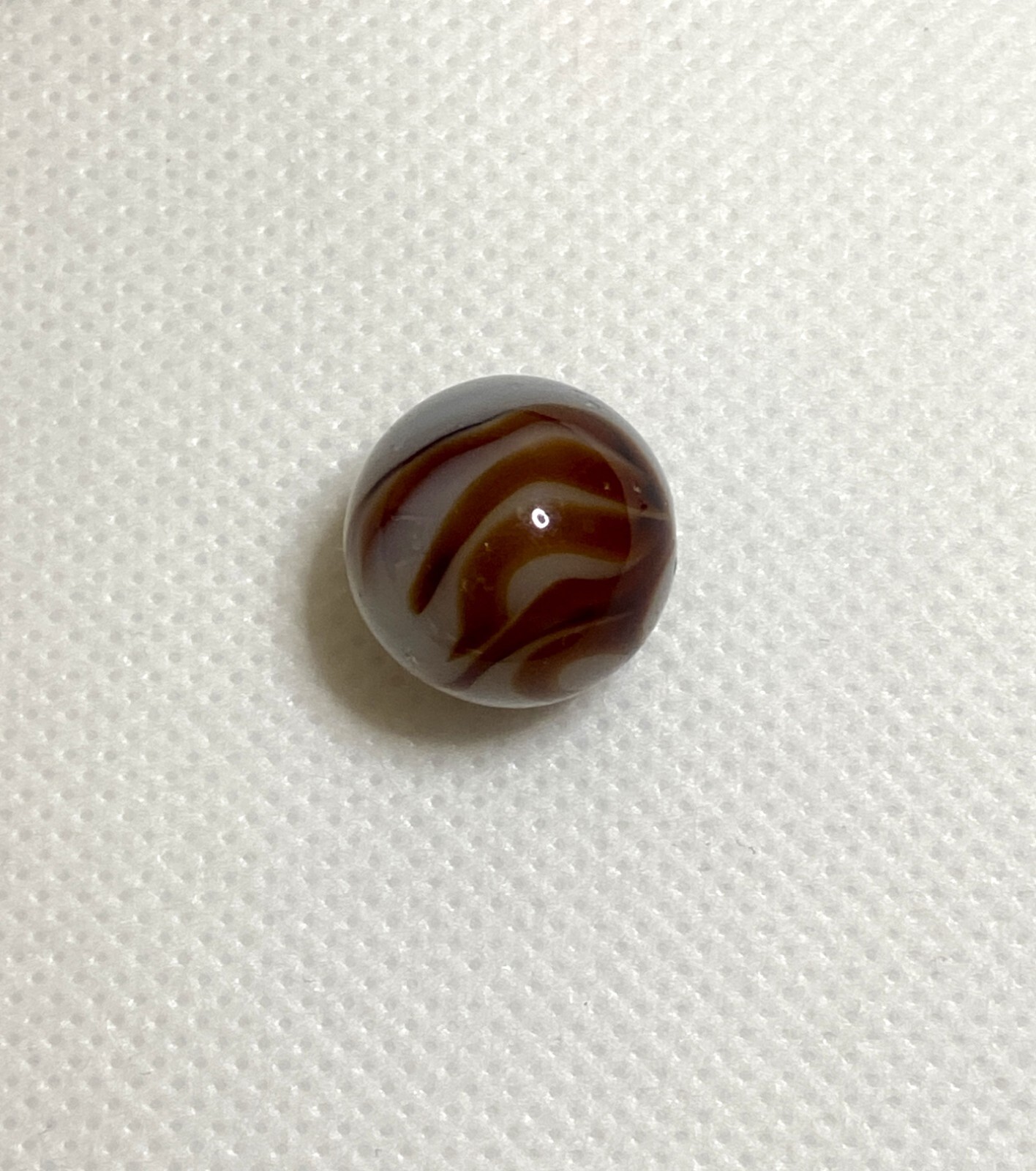 ALLEY AGATE CO. TRANSPARENT LIGHT BROWN FLAME SWIRL .63″ NM – MAA149
