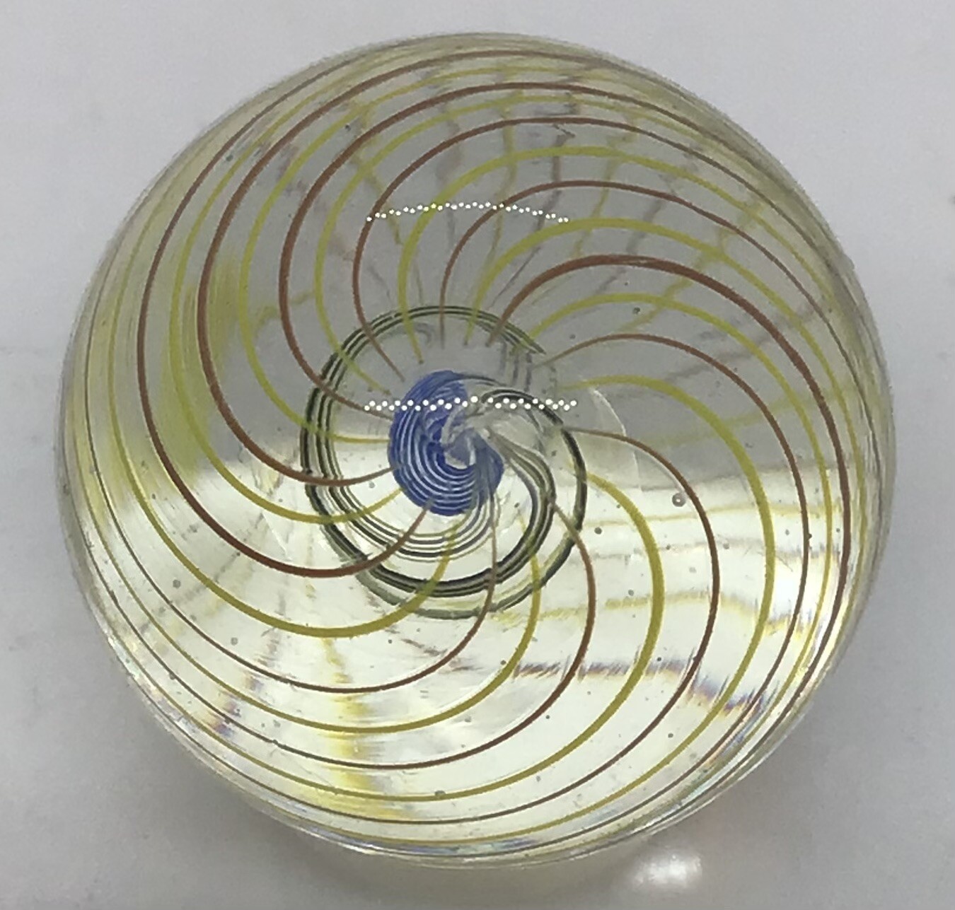 Contemporary Divided Ribbon core marble. It measures .88” in mint condition.