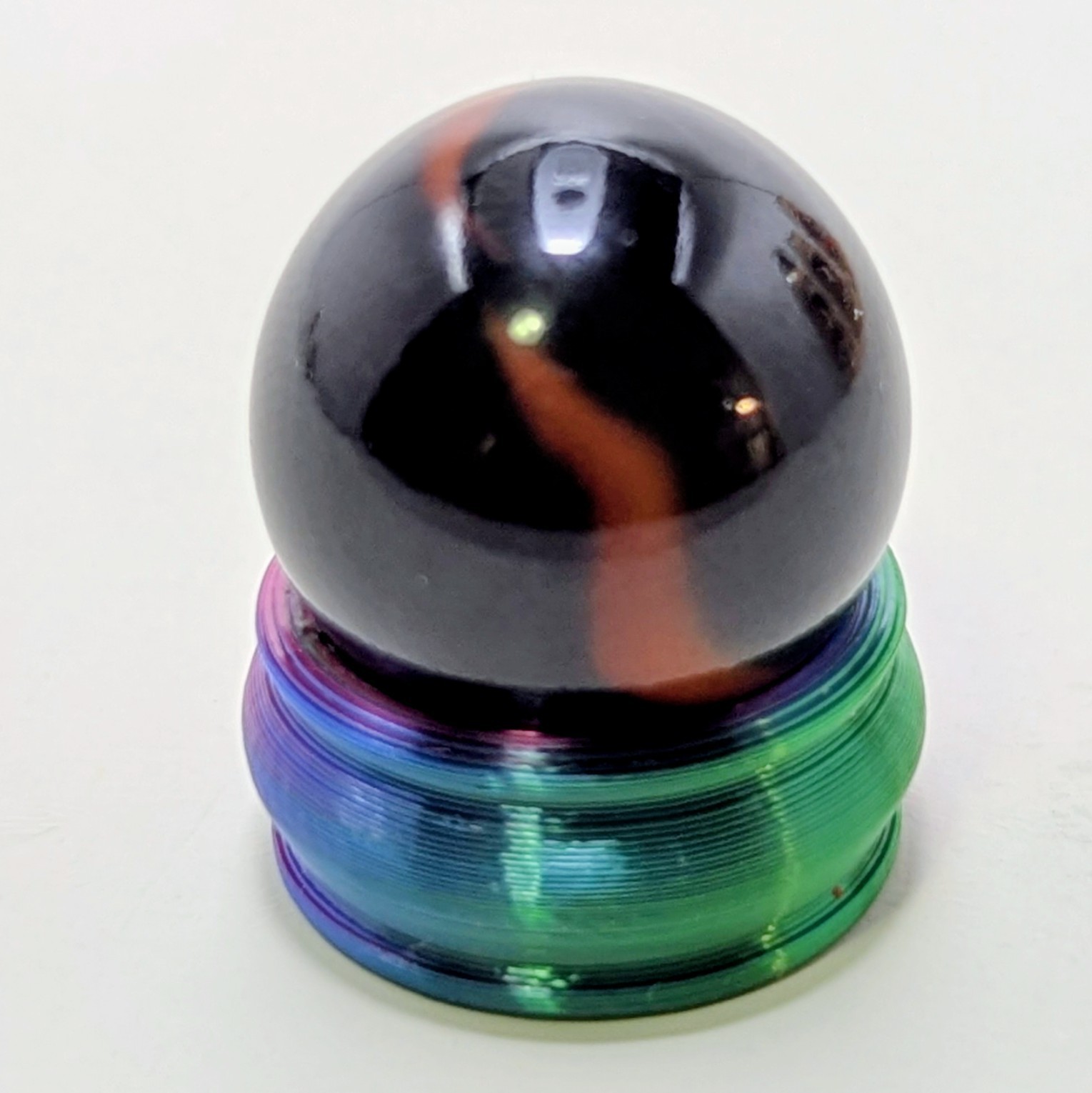 Peltier Glass Company National Line Rainbo Black Tiger Oxblood Wet-Mint 5/8″