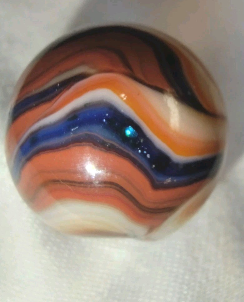 Jabo/DAS Cranberry Busy Gorgeous Flame Swirl Shooter Marble .74 Out Of Round