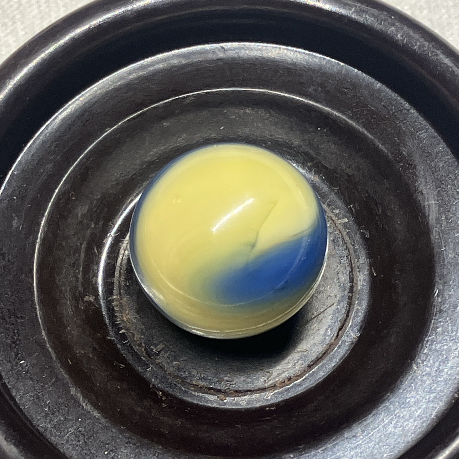 Vintage Akro Agate Corkscrew swirl banana yellow ocean blue glass marble wet