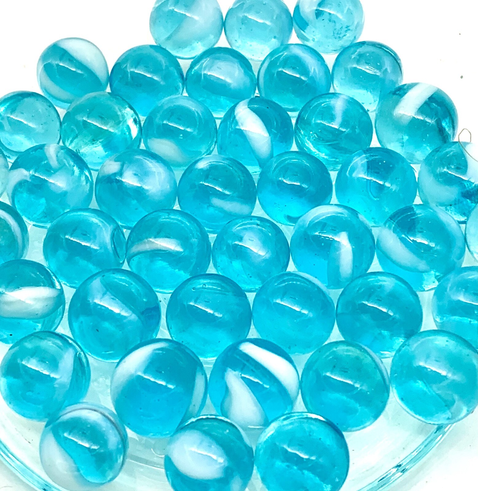 Pk 25 Oxygen 12mm (.5″) PeeWee Glass Marbles Transparent Sky Blue w White Swirls