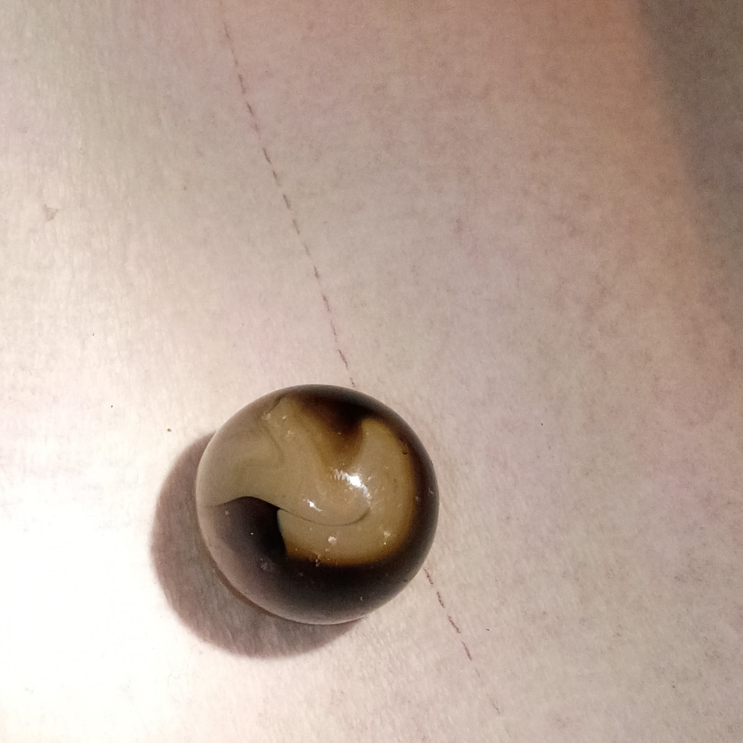 Brown, Tan, and Black Swirl Glass Toy Marble for Ages 17 Years & Up