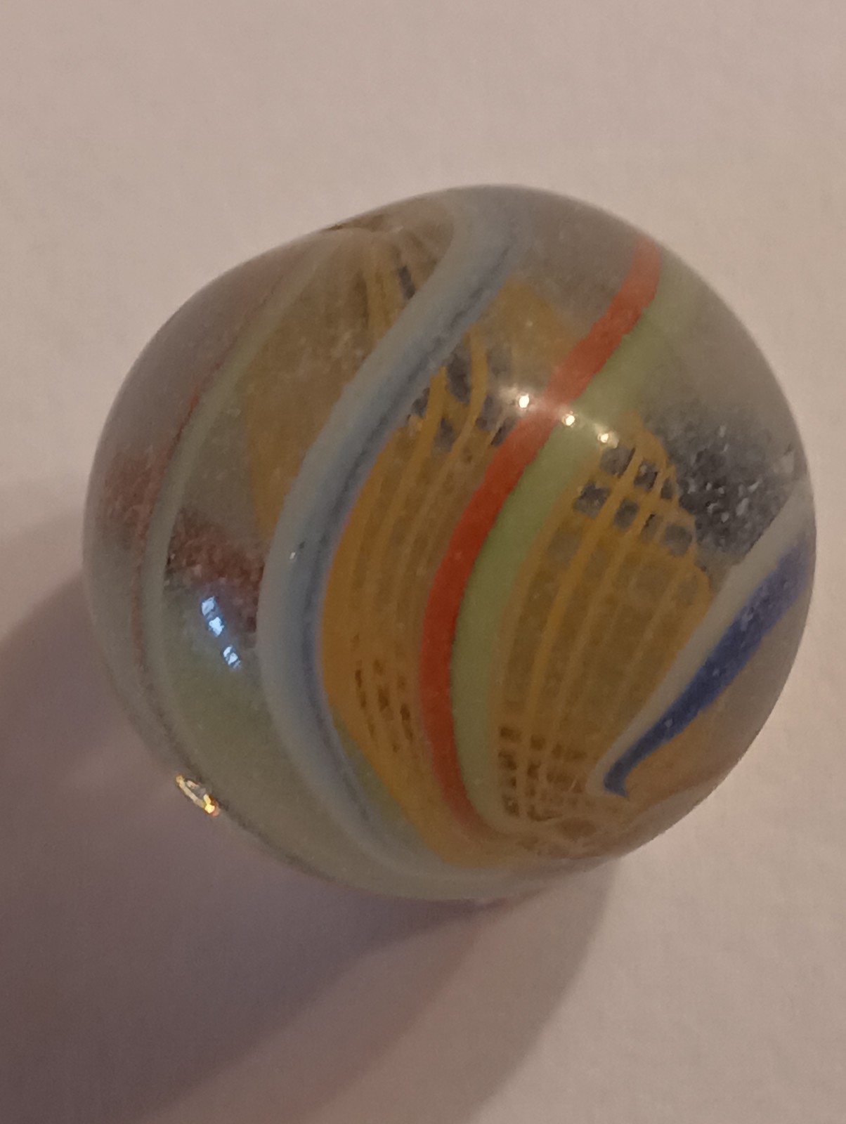 German Latticinio Yellow Core Marble. .74 Inch Blue White / Red Green Stripes