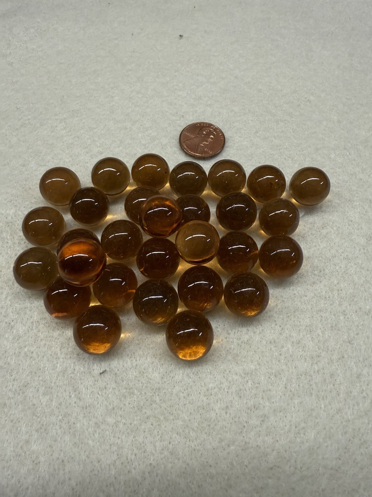 Vintage Amber Color Glass West Virginia Marbles – Approximately 9/16″