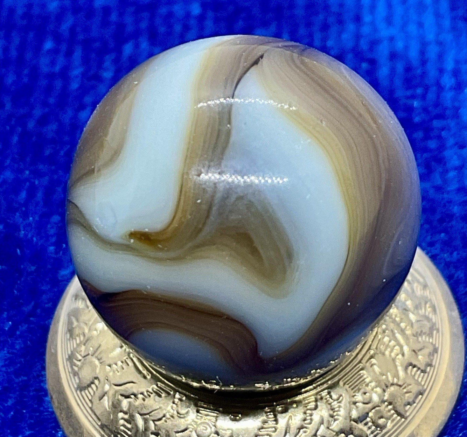 A Vintage Alley Agate “Pistachio” UV Marble. Measures .66” Mint Condition.