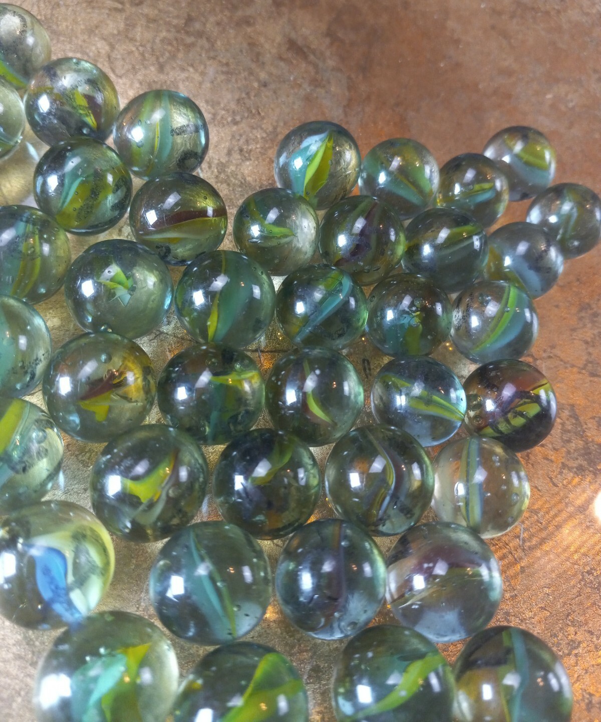 Vintage collection of 50 green glass marbles