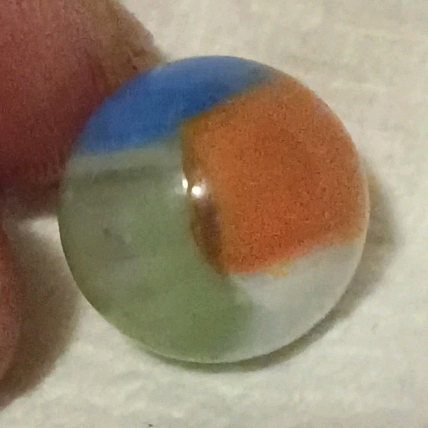 beach ball marble colorful orange blue green white and yellow