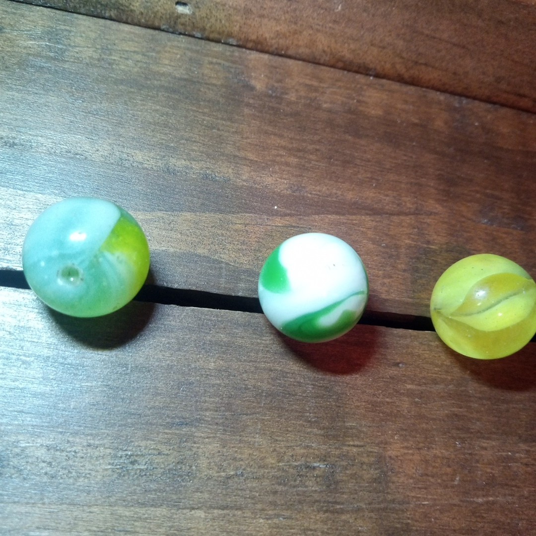 4 Vtg Uranium Glass Swirl Shooters Marbles UV Reactive Blacklight Glow Vaseline