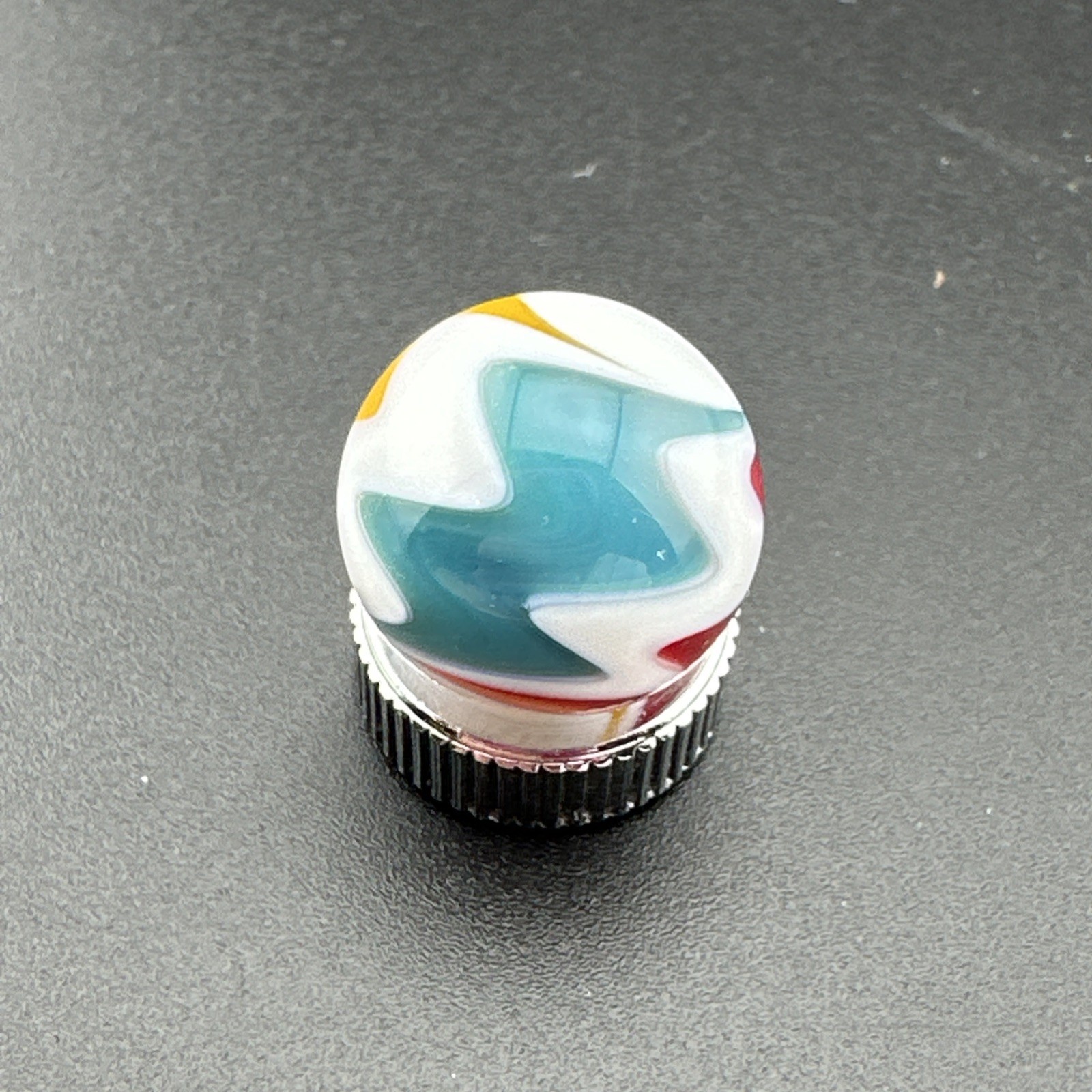 Contemporary Handmade Art Glass Marble .64″ Wavy Red Blue White Yellow Swirl MIB