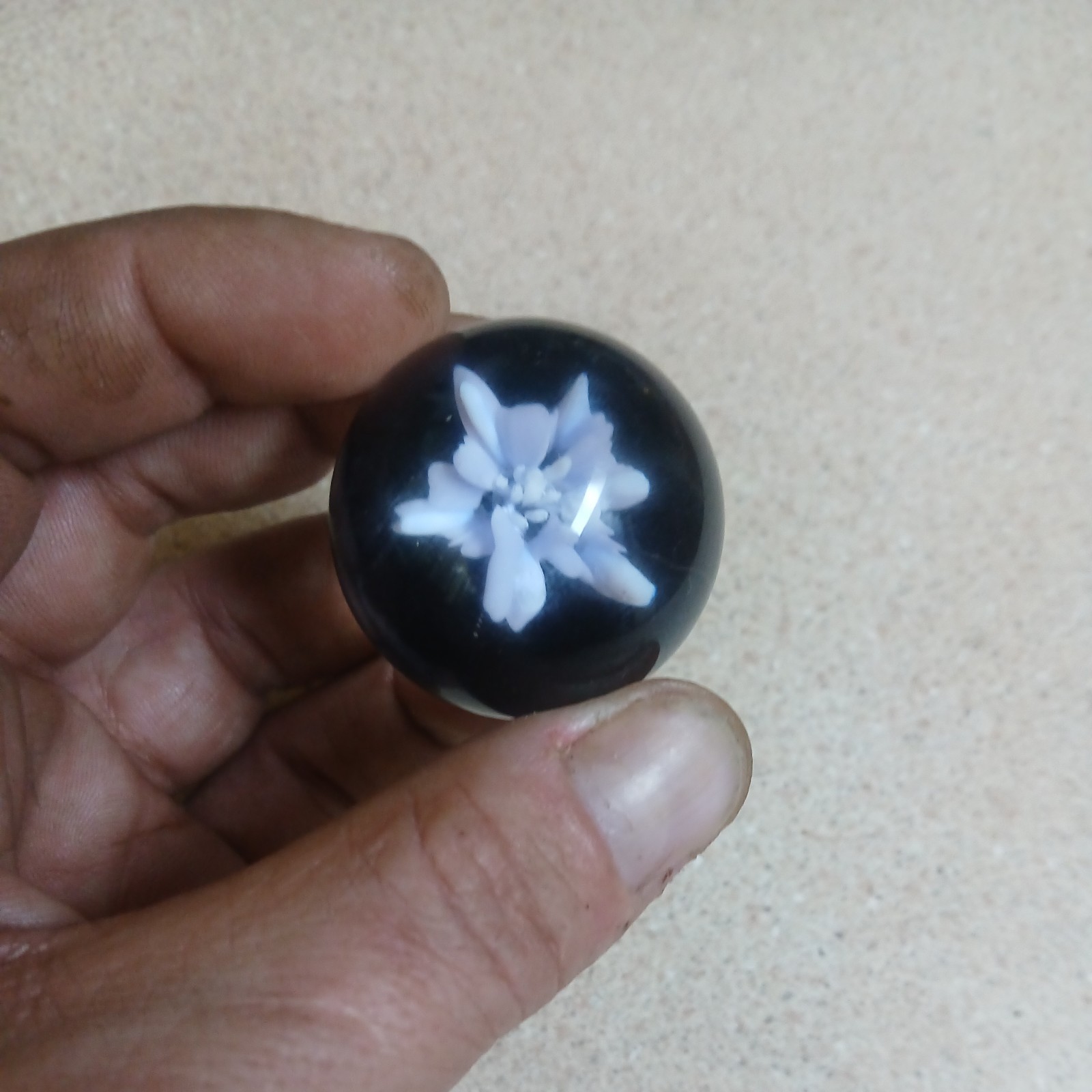 1 1/2 Inch Flower Implosion Marble with pink uv in the middle