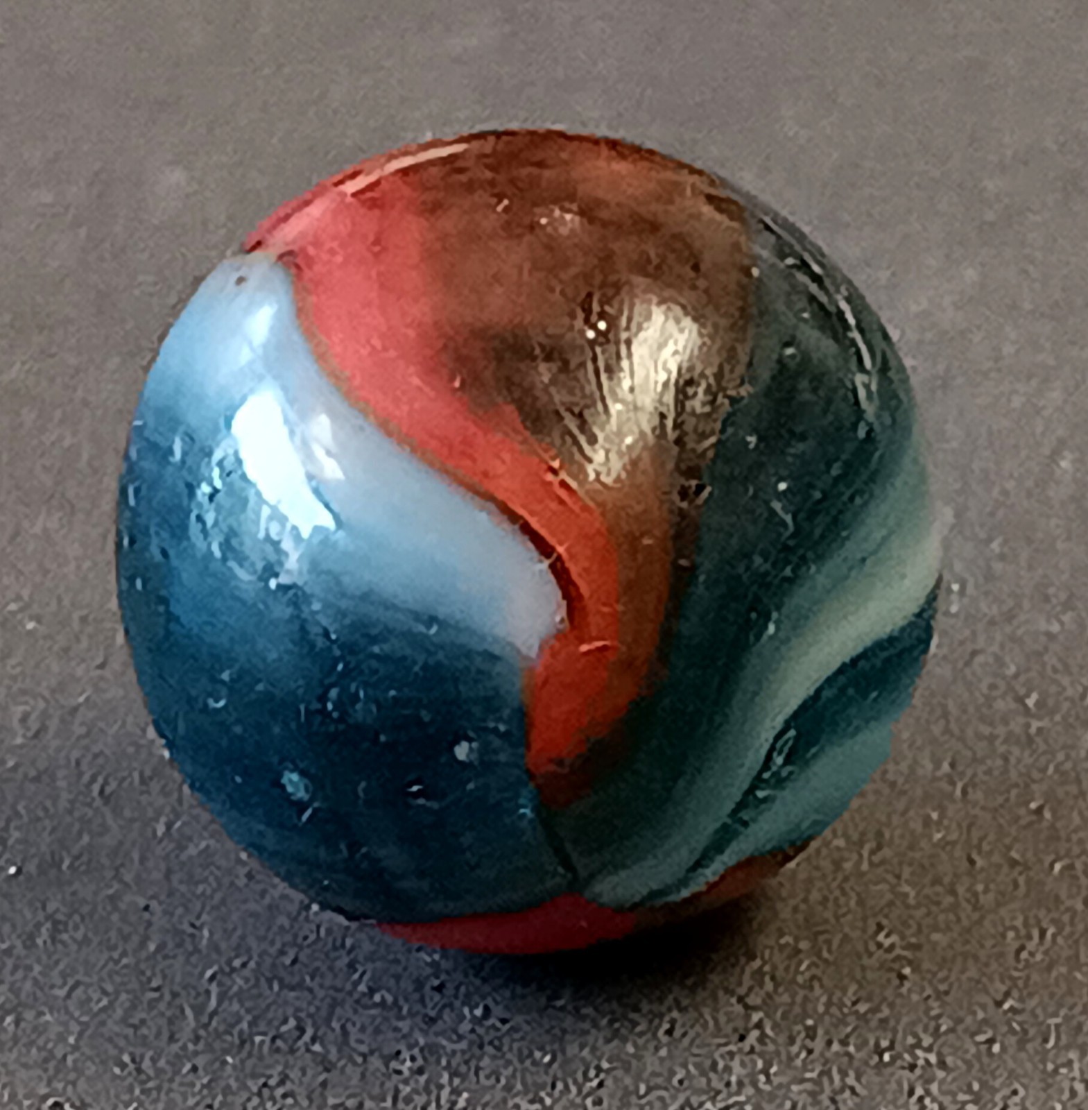 Peltier Miller MCS Rainbow Marble .64″ Clear Dark Trans Blue Base – Red & White