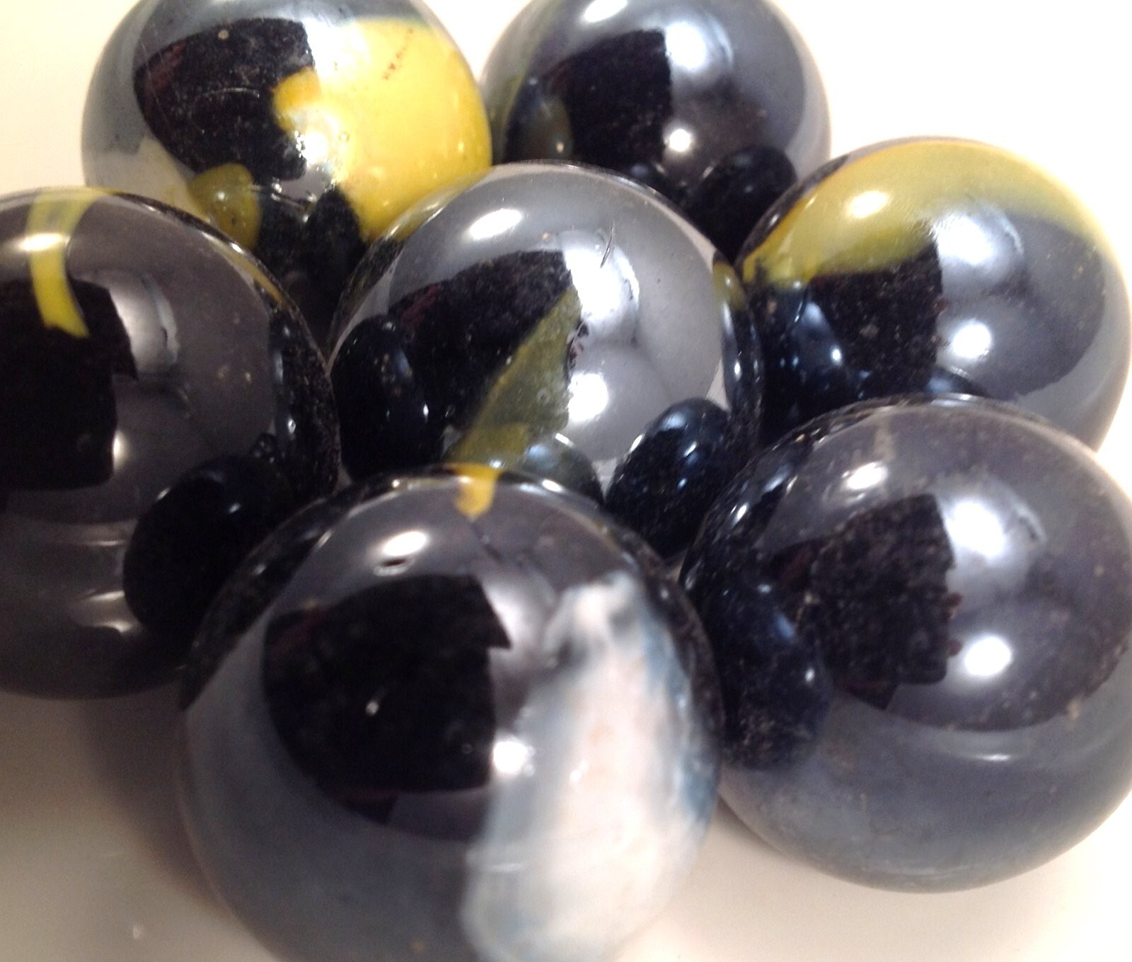 Glass Marbles 1″ – 12oz bag Black w/white & yellow swirls 16pcs