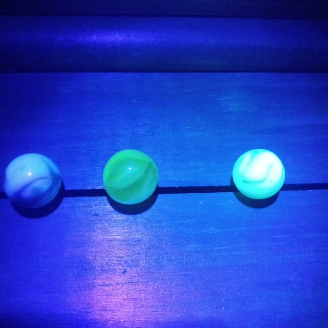 4 Vtg Uranium Glass Swirl Shooters Marbles UV Reactive Blacklight Glow Vaseline