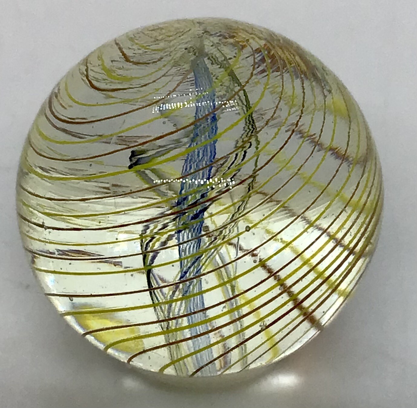 Contemporary Divided Ribbon core marble. It measures .88” in mint condition.