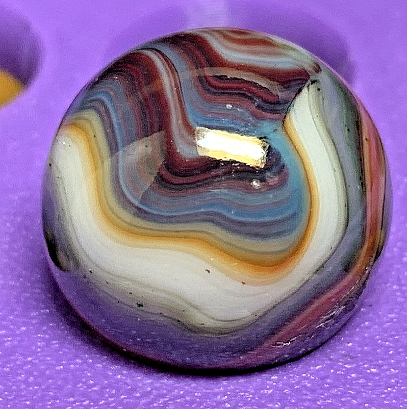 DAS/JABO/WV FLAMES ANEMIC OXBLOOD & AVENTURINE BITS SWIRLS SHOOTER .72″ 10B/78