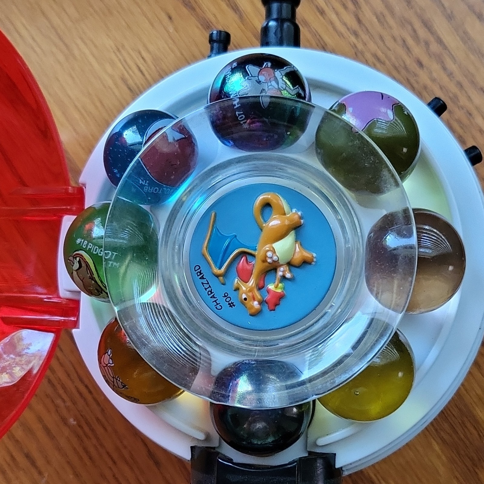 Pokémon Charizard #006 Glass Toy Marbles Set w/ Plastic Round Carry Case.