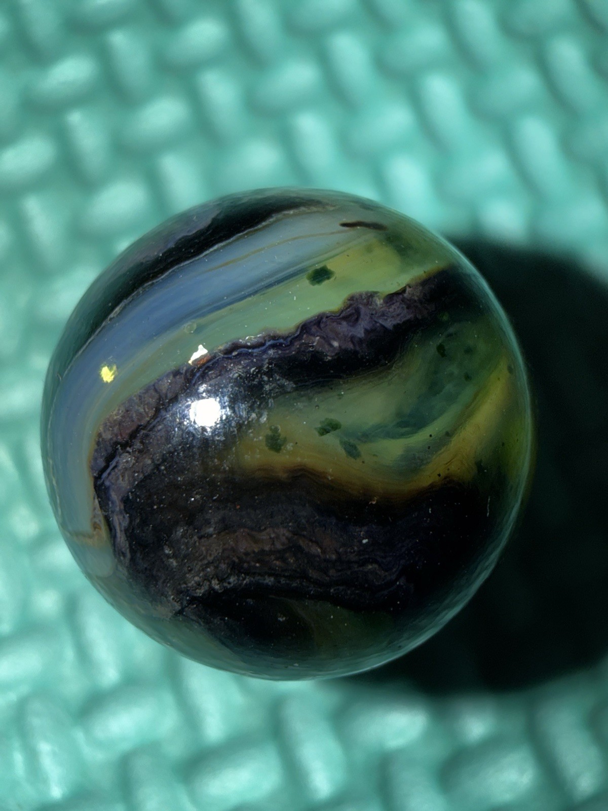 One (1) 2008 JABO Peltier Mansion Run .62 Silver Strike Marble