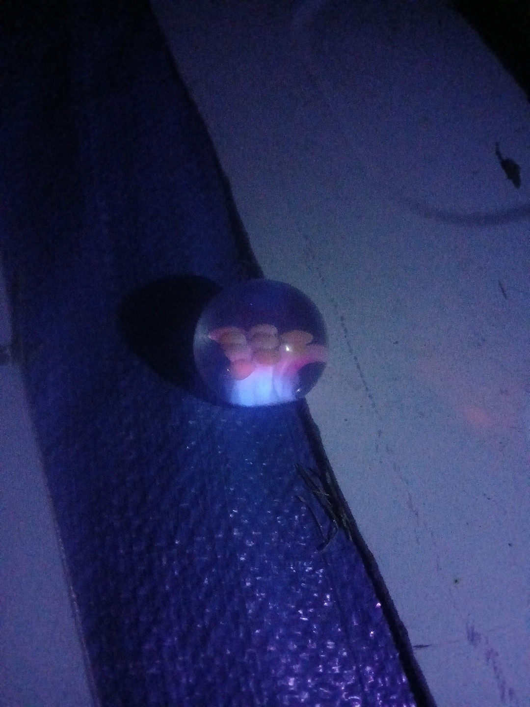 American Made Hand Blown Silver Fumed Implosion Marble. UV Reactive