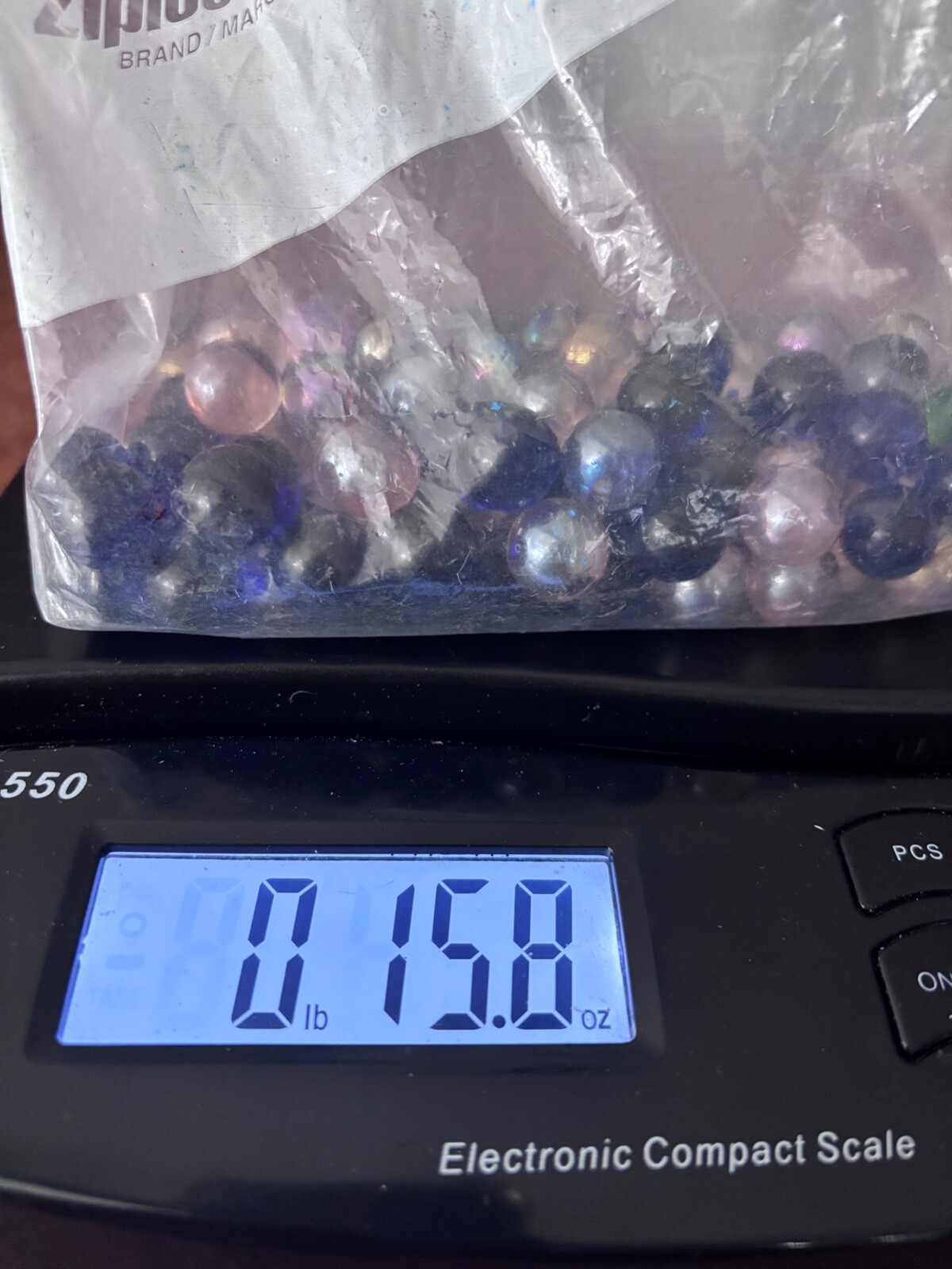 Small LOT 15 ounces marbles Small Size Not sure of age Dark Blue & Opalescent