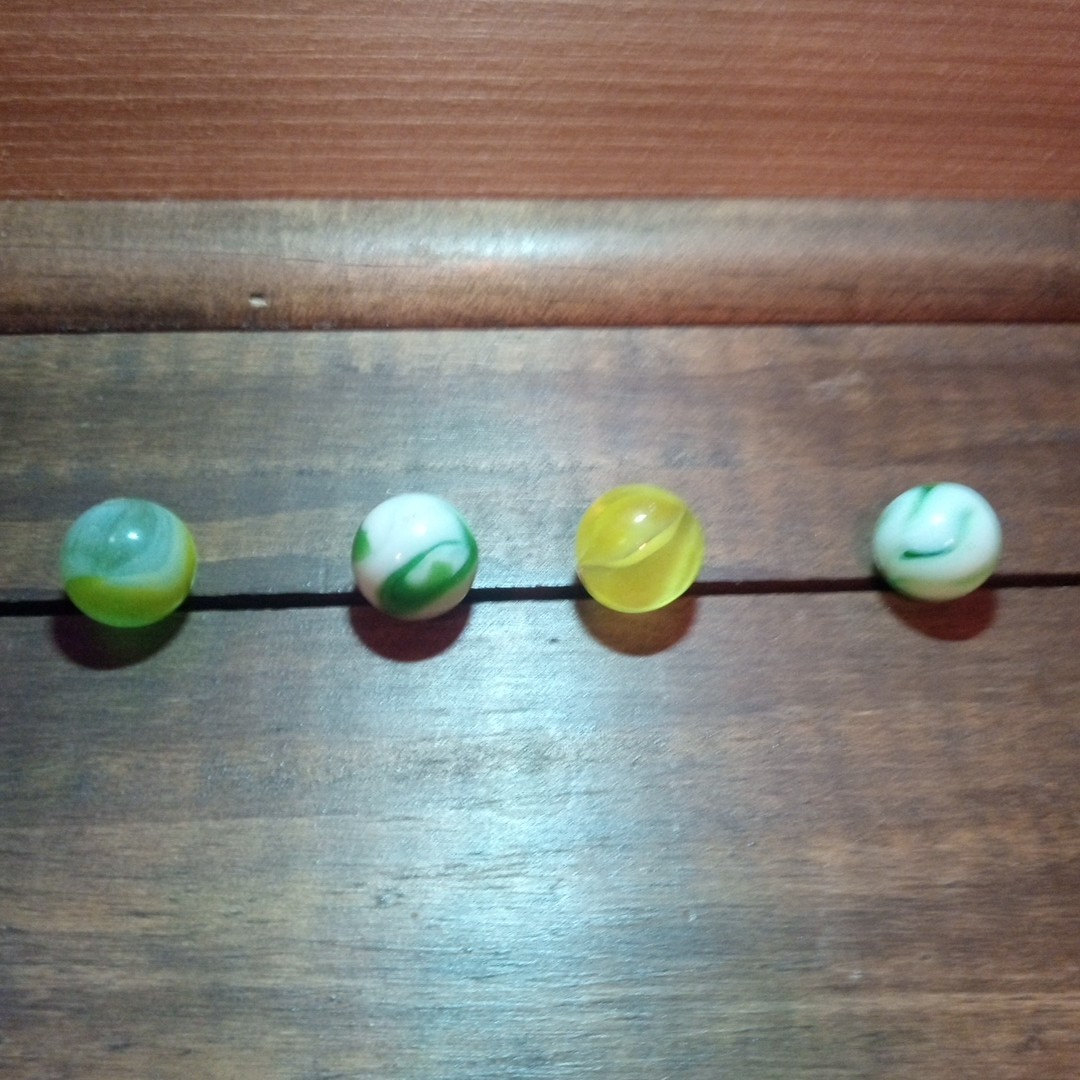 4 Vtg Uranium Glass Swirl Shooters Marbles UV Reactive Blacklight Glow Vaseline
