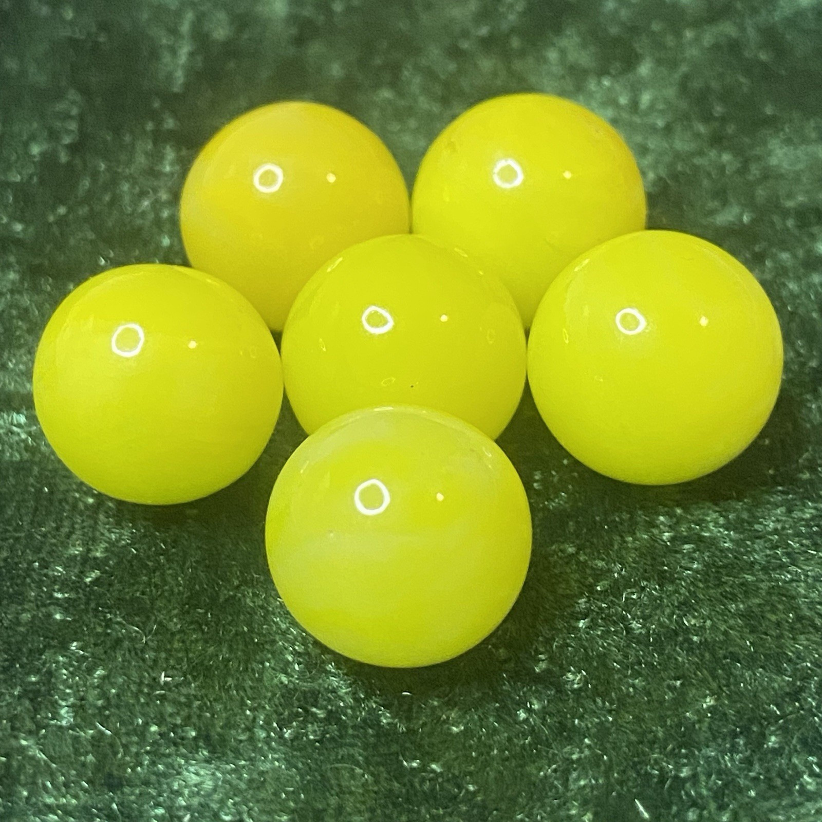Lot of Six Bright Green Marbles That Glow Orange/Pink Under UV Blacklight