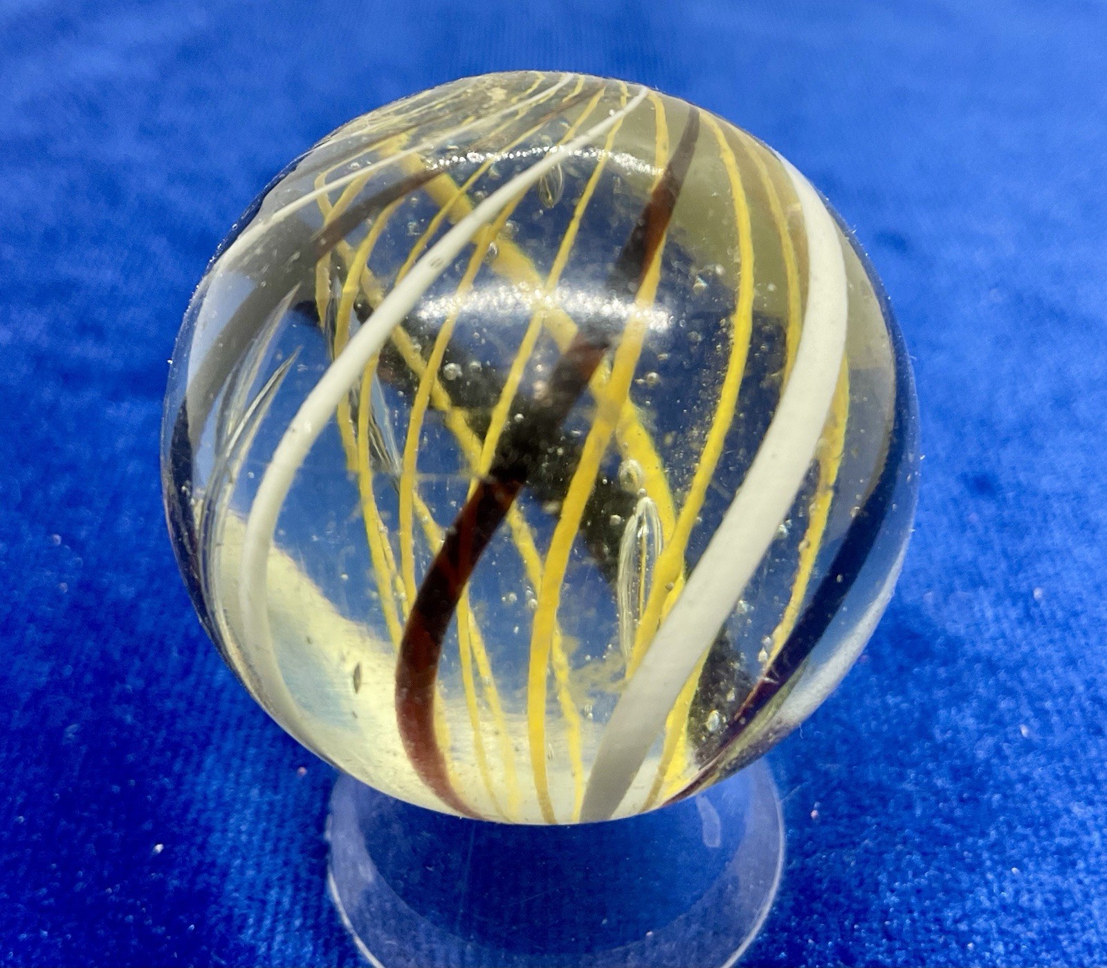 A vintage German Handmade Yellow Latticinio Marble. Measures 1.59 “ Near Mint.