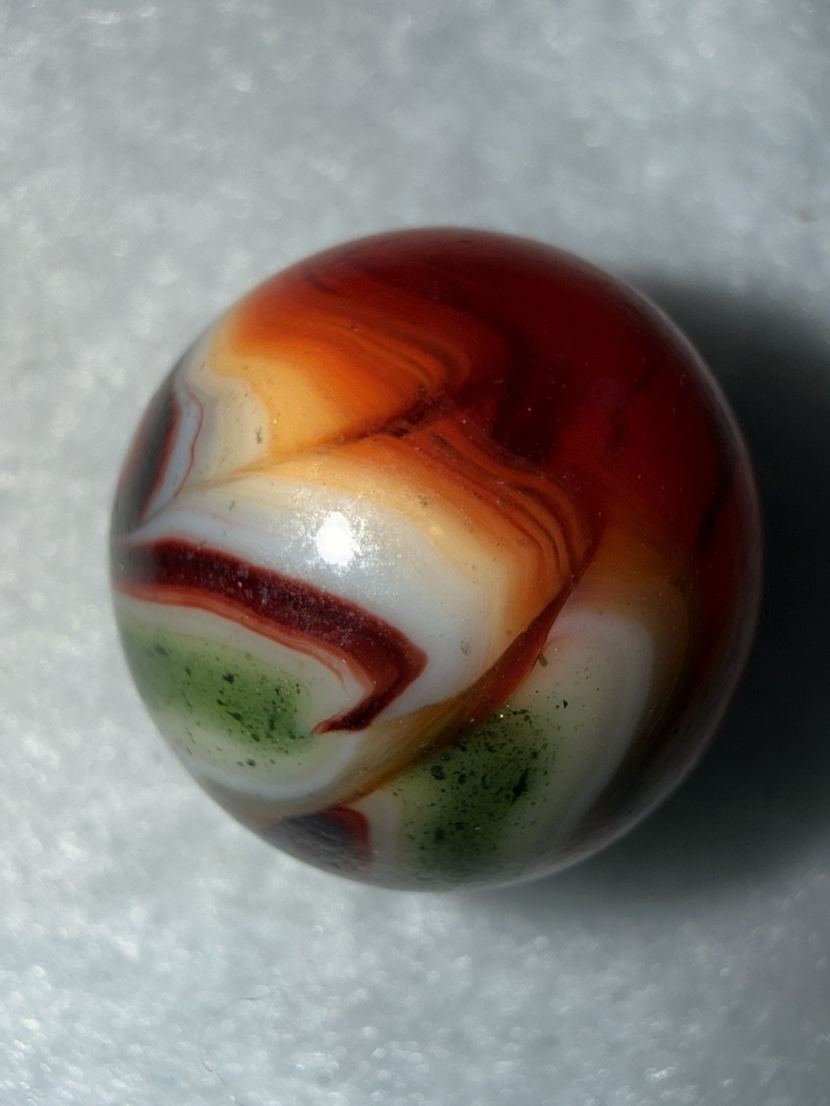 JABO Joker 1 (JERK) Collector Marble : Cranberry Apricot & Aventurine Swirl. .74