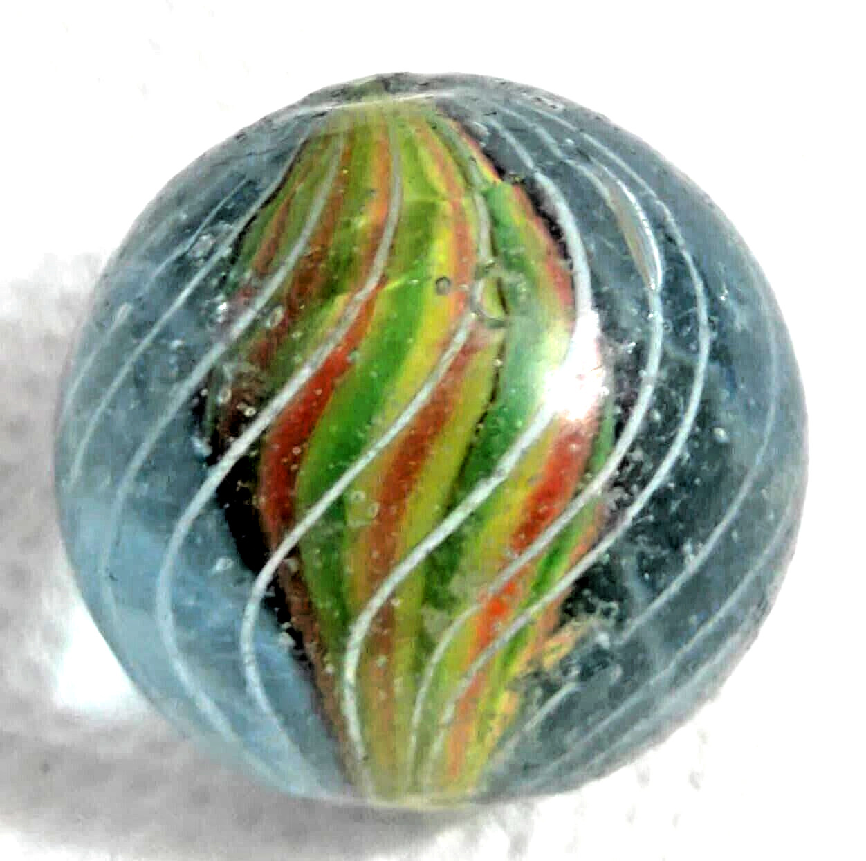 OLD 2 TOY MARBLES multi colored solid core caged 1 tri level ,2 blue base glass