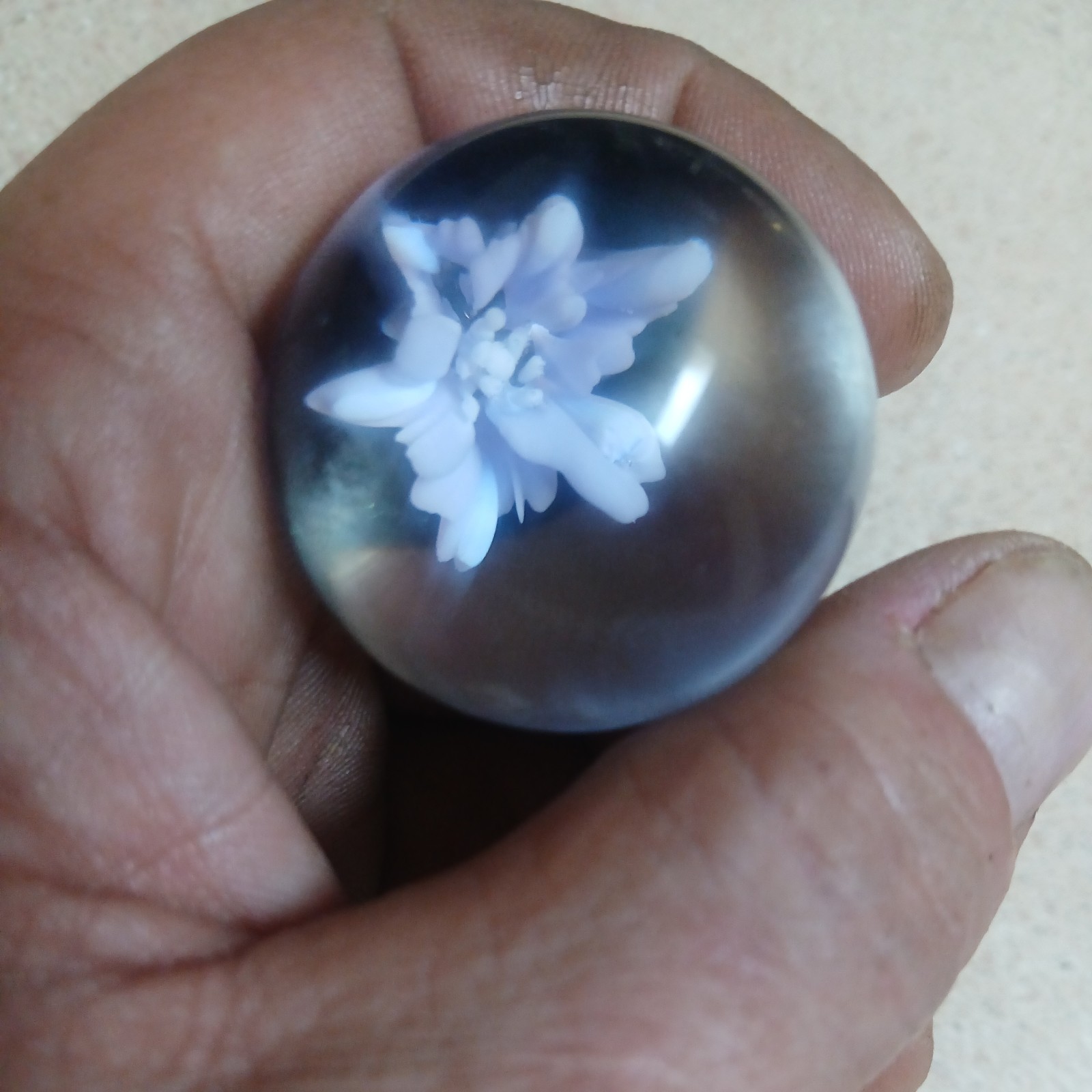 1 1/2 Inch Flower Implosion Marble with pink uv in the middle