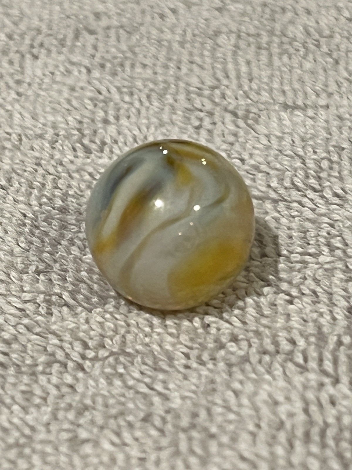 Alley or Champion Yellow Gold Translucent Furnace Swirl .63 Wet Mint