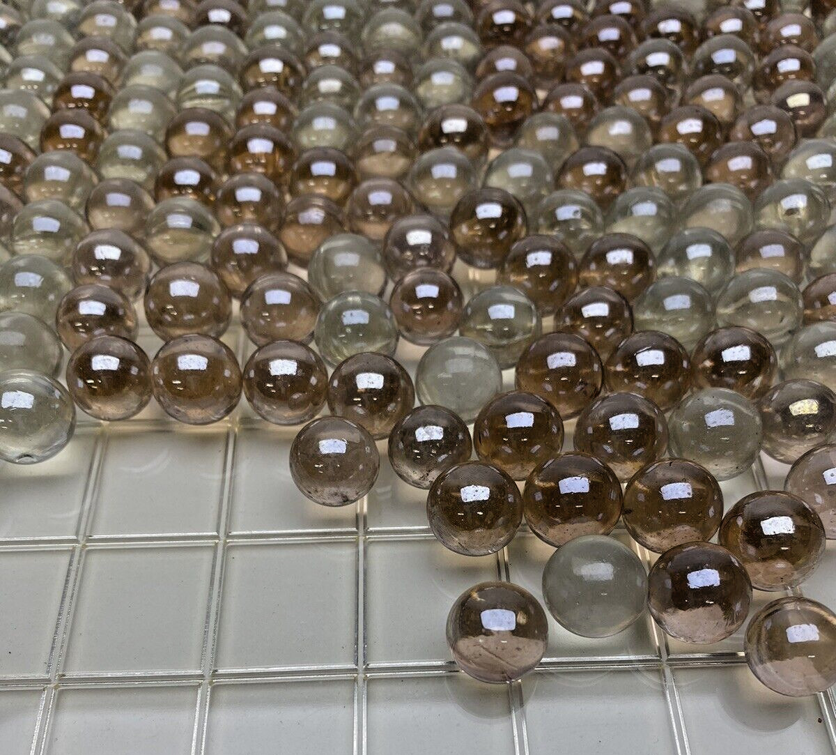 Lot of 600+ SHINY LIGHT IRIDIZED PINK COLOR – ROUND GLASS MARBLES .550″ CLEAR