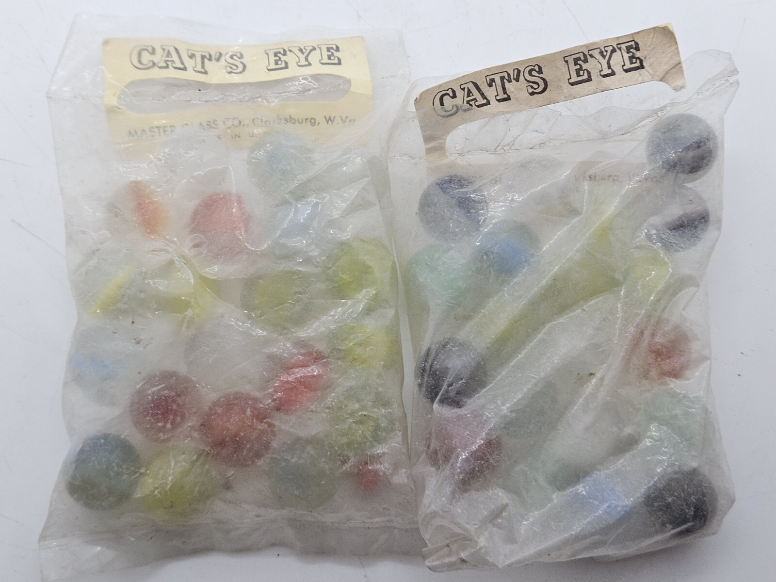 Antique 2 NOS “Cat’s Eye” Marbles Marble Bags Master Glass Co. Clarksburg W. VA.