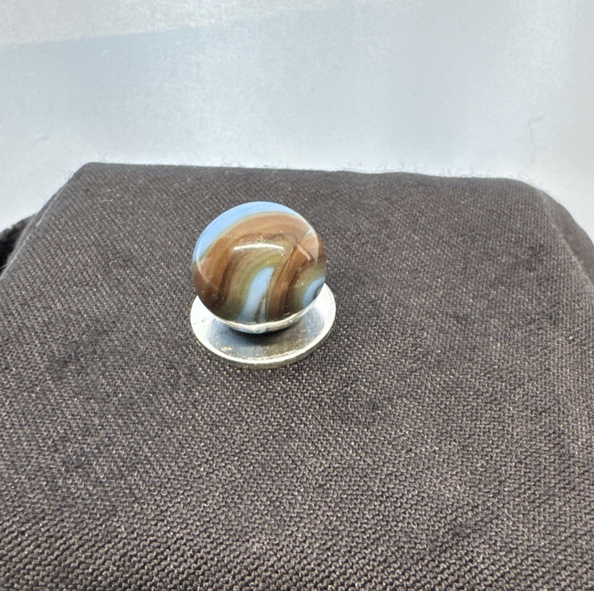 Christiansen Agate Opaque Blue Base With Brown Swirls..63″ Wet Htf Brown