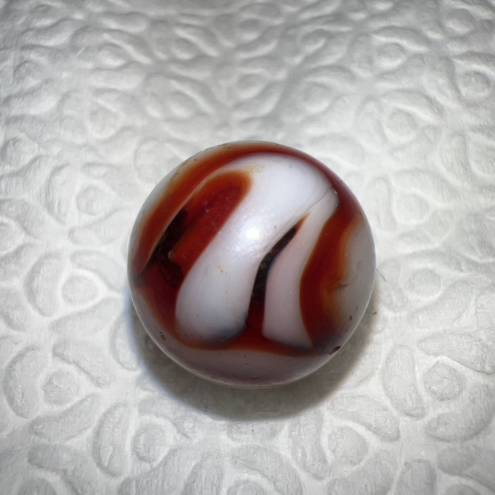 Stunning Alley Agate Oxblood Swirl Marble. .5