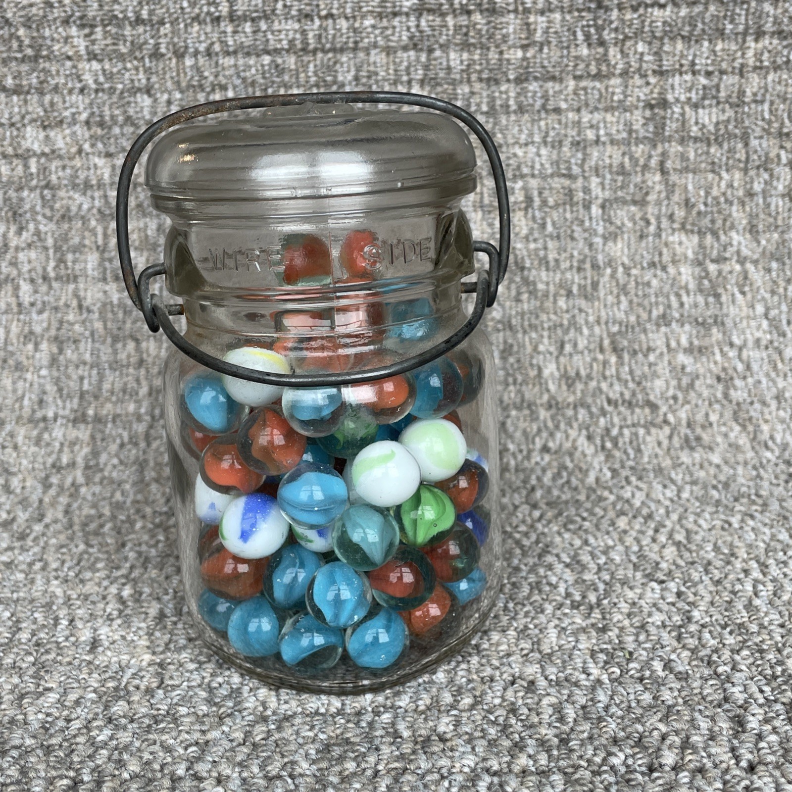Vintage Glass Ball Ideal Jar Filled With Marbles. Jar Is 5 1/2” Tall.