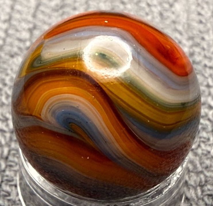 JABO / DAS .63″ Mint UV Glows Oxblood Orange Blue Yellow Swirl Marble (274)